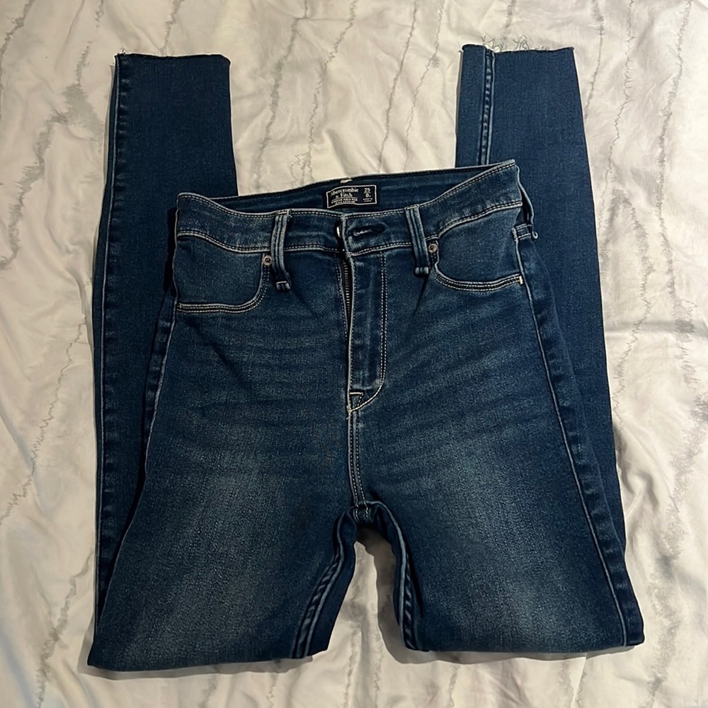 Dark wash skinny jeans from A&F. High rise jean legging. Not distressed.
